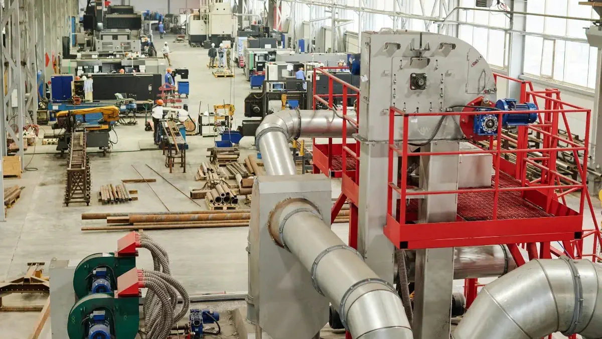Smart manufacturing plant using AI for energy optimization, predictive maintenance, and quality control